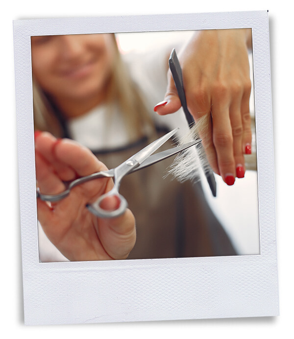 polaroid woman cutting hair
