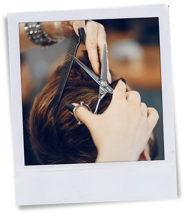 polaroid cutting hair with shears
